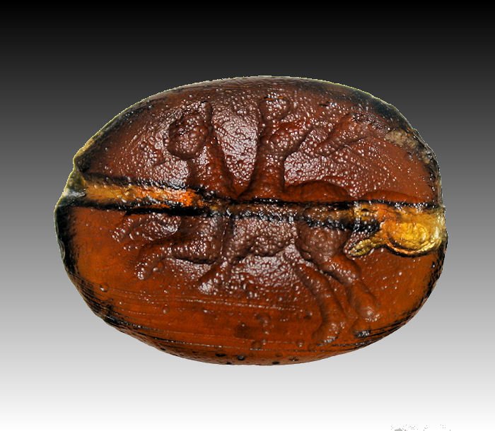 Ancient Roman Glass Intaglio with a Horse and rider: Ancient Roman Glass Intaglio with a Horse and rider Circa 1st - 2nd century AD. Size: 23 x 17 mm.Â Oval shape Glass Intaglio with a horse and rider running left. minor tiny chip at the edge otherwis