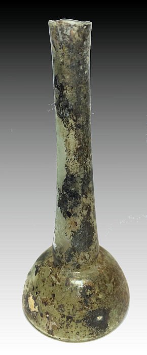 Ancient Roman Glass Bottle Circa 2nd century AD.: Ancient Roman Glass Oil Bottle Circa 2nd century AD. Size: 5 inches high. (12.7 cm)Condition: Rim Damaged. Provenance: Retired NYC Dealer 1980's.