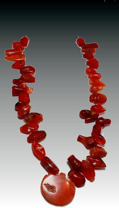 Ancient Roman Carnelian Necklace c.1st Century AD: Ancient Roman Carnelian Necklace c.1st Century AD.Early Roman Carnelian Stone Beads of Various shapes, Probably Egypt? Size 10 5/8 inches length (27 cm) Beads size 14 - 26 mm.Great for jewelry. Proven