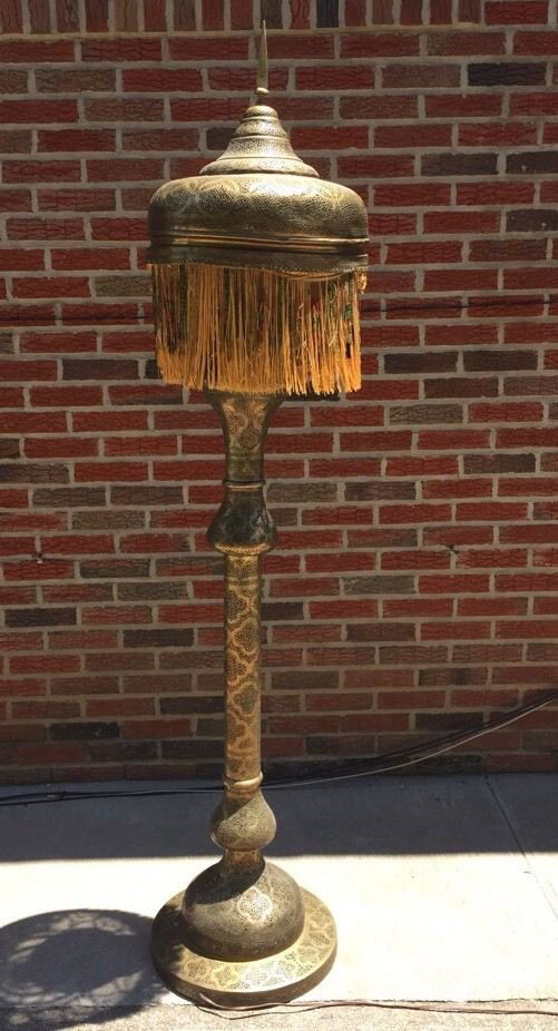 Antique Middle Eastern Syrian Brass Floor Lamp: Antique Middle Eastern Syrian Brass Floor Lamp with open work.Size:Approx. 74 inches high With the shade, and 16 inches Diameter.Already wired. Condition: used. fine condition.