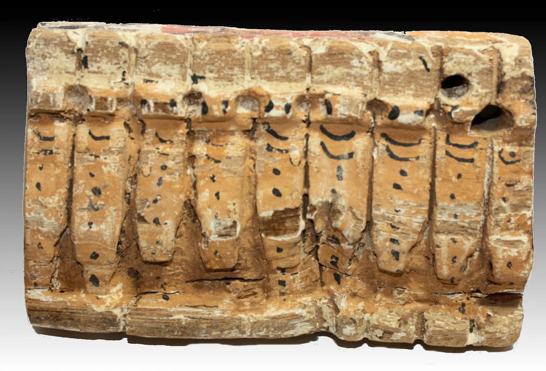 Ancient Egyptian Wood Uraeus Group serpent c.700 BC: Ancient Egyptian Wood Uraeus Group serpent wearing a crown Late Period, 700-30 B.C.Size: 5 3/8 inches length x 3 3/8 inches high (13.5 x 8.5 cm high).A Panel of Nine Uraeus serpent wearing a crown. GR