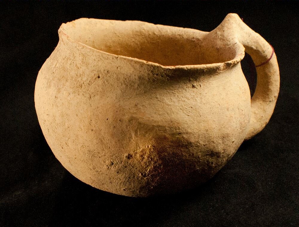Ancient Bronze Age Holy Land Dipper Cup 2nd millennium: Ancient Bronze Age Holy Land Dipper Cup 2nd millennium B.C. Size: 4 3/4 inches diameter x 2 3/4 inches high.(12 x 7 cm) Early Pottery cup with globular body, everted rim, loop handle. chipped at the e