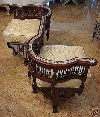 Moorish Egyptian Mahogany Conversation Settee Love Seat: Moorish Egyptian Mahogany Conversation Settee double seat conversation settee or love seat. Size 53 inches long, 34 inches deep and 28 inches high.It has two individual seats with tub shaped arms an '