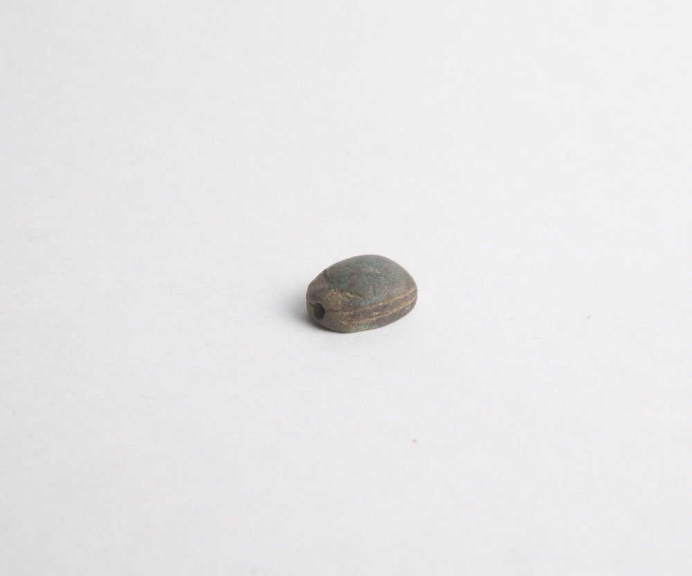 Ancient Egyptian Steatite Scarab Ca. 1500-30 B.C.: Ancient Egyptian Steatite Scarab Ca. 1500-30 B.C. Size 16 x 12 mm. a Steatite Stone scarab with hieroglyphic inscription, surface weathering and losses. Provenance:NYC collection, ex. Tarshish Gallery