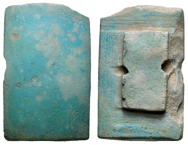 Ancient Egyptian Blue-green faience tile. Old Kingdom,: Ancient Egyptian Blue-green faience tile. Old Kingdom, 2686-2181, possibly Third Dynasty, 2686-2613 BC. Tile with rear piercing on back for mounting in a central, raised area. They are frequently attr