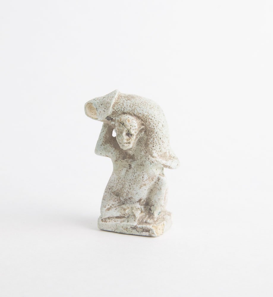 Ancient Egyptian Faience Phallic Figure, Late Period, c: Ancient Egyptian Faience Phallic Figure, Late Period, c. 625 - 50 B.C. Size 1 7/8 inches high. Chipped and small repair by the face. Very Unusual Ancient Egypt Faience figure on integral base, his ove