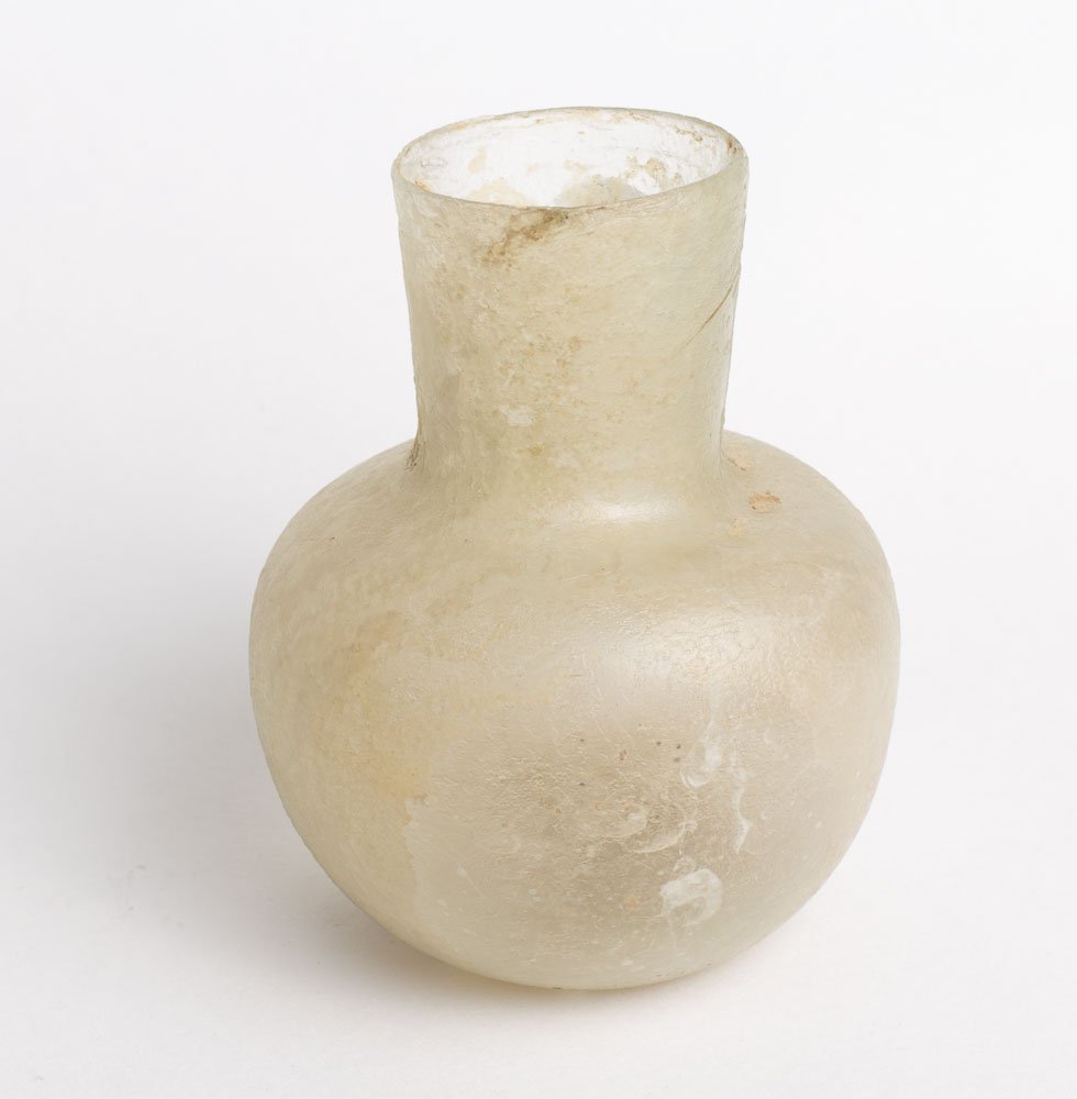 Ancient Islamic Patina Glass bottle c.8th century AD.: Ancient Islamic Patina Glass bottle c.8th century AD. Size 4 inches high. Very Attractive Glass bottle with nice patina. Perfect condition. Provenance: EX Frishman Gallery Tel Aviv Israel, Ex NYC Coll