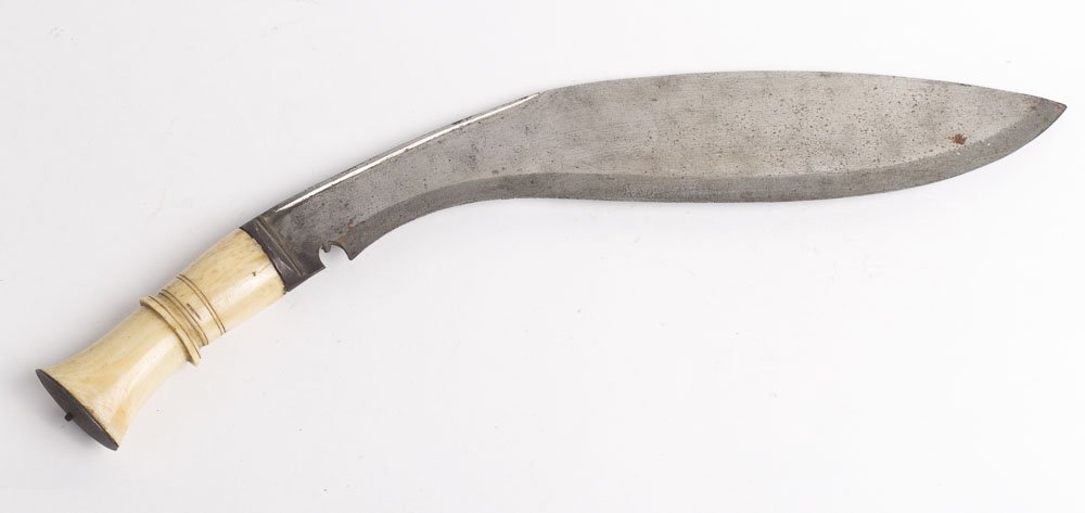 Antique Indonesian Steel Knife with bone handle: Antique Indonesian Steel Knife with bone handle. Size 16 1/2 inches length. a Massive steel blade with fine carved bone handle. Good condition.