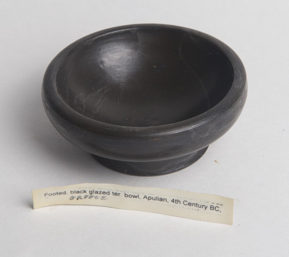 Ancient South Italian Apulian Pottery bowl c.4th cent: Ancient South Italian Apulian Pottery Bowl c.4th century BC. Size 3 1/8 inches diameter x 1 1/4 inches high. Nice Form of ancient Apulian footed bowl. Perfect condition. Provenance: Ex Lester Gross Co
