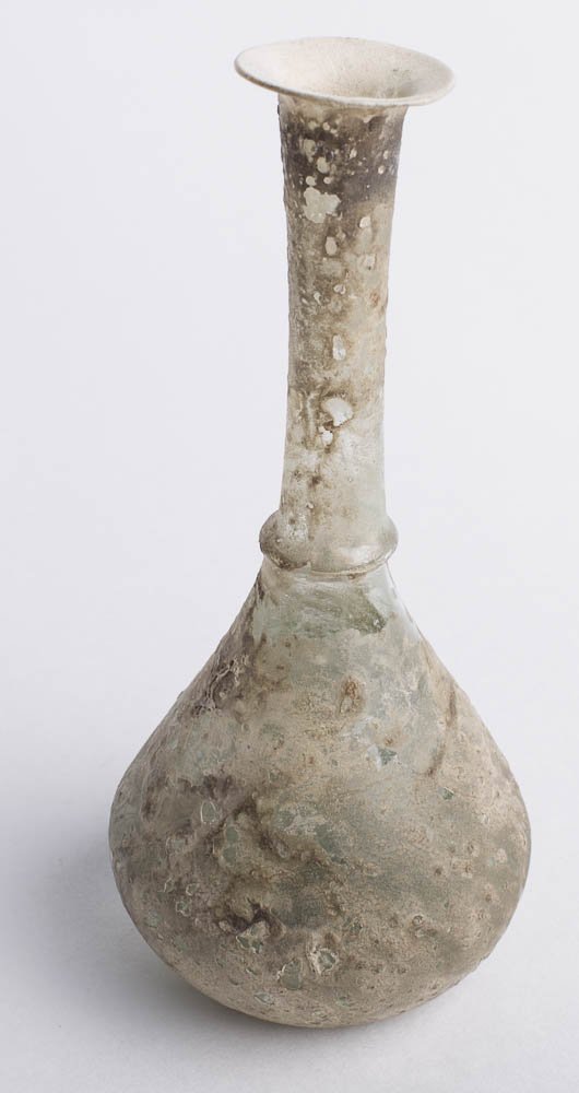 Ancient Roman Glass Bottle c.1st-2nd cen AD: Ancient Roman Glass Bottle c.1st-2nd cen AD. Size of the bottle 5 inches high. Ancient Roman Blown glass bottle with bulbous body and long neck. Condition Intact. Provenance: Ex Collection of Maxine F