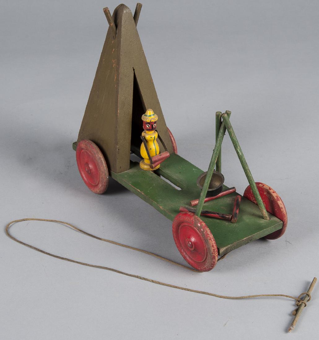 Unusual animated wood pull toy of a man emerging (1 of 1)