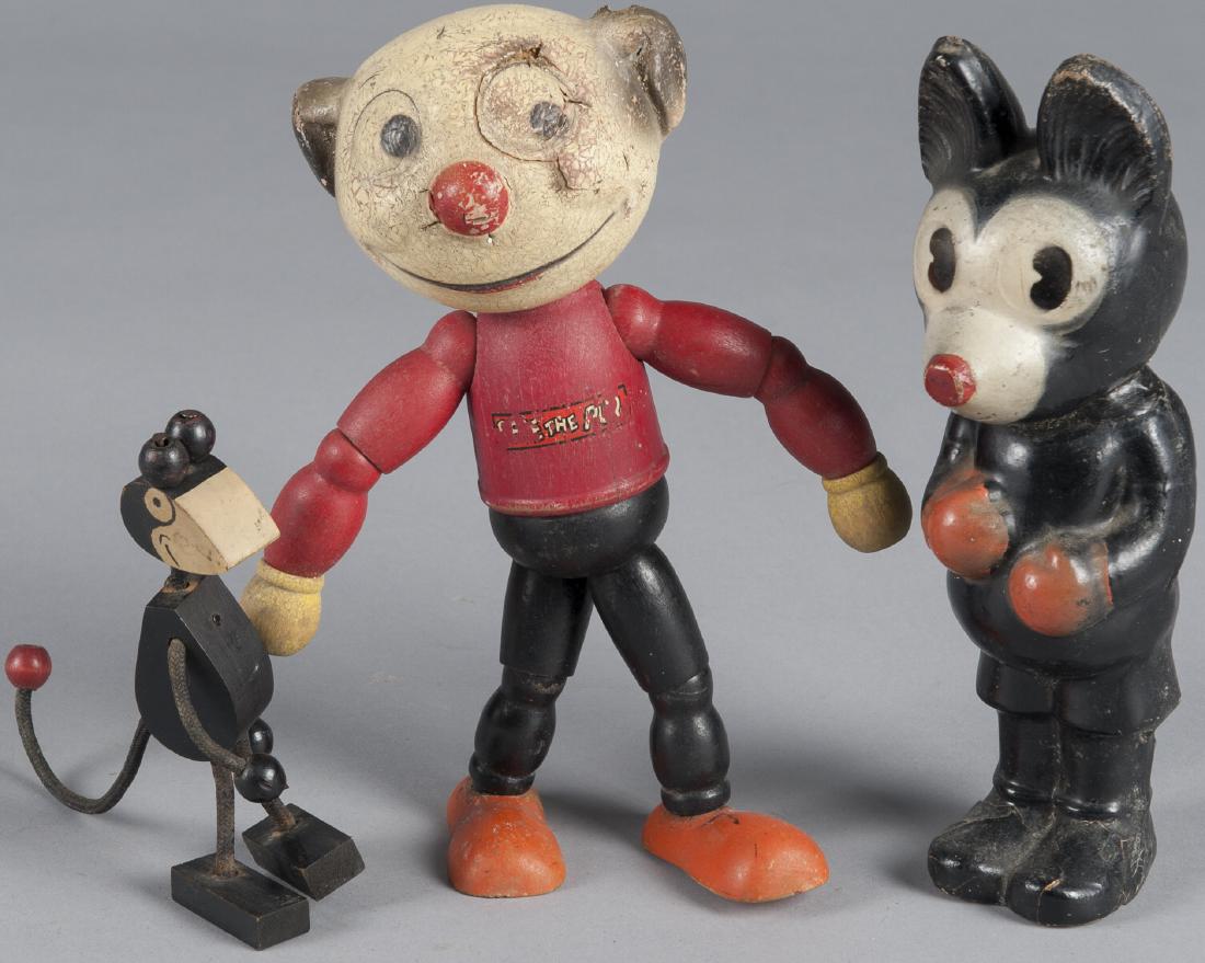 Three comic character figures, to include a compo (1 of 1)