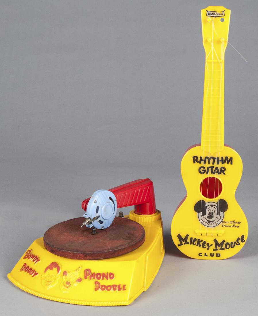 Shura-tone plastic Howdy Doody Phono Doodle recor: Shura-tone plastic Howdy Doody Phono Doodle record player, 9'' w., together with a Mickey Mouse Club Rhythm Guitar, 16 3/4'' l.