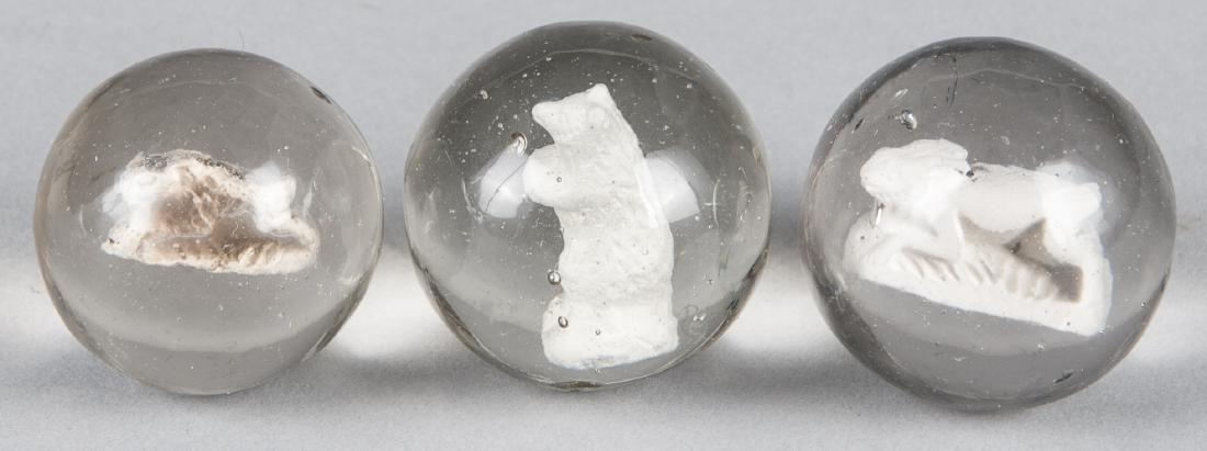 Three sulfide marbles, to include two running rab (1 of 1)
