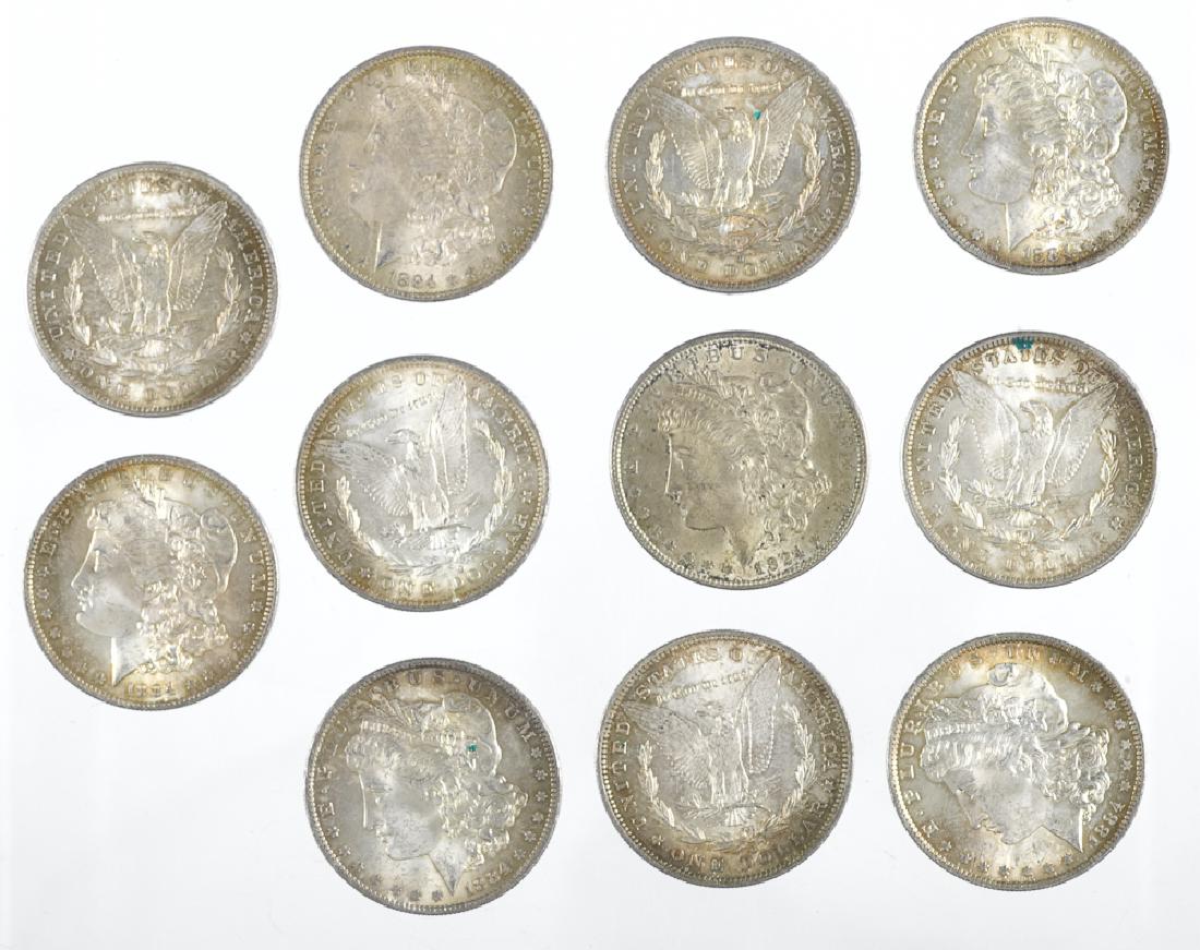 Eleven Morgan silver dollars, 1884 O. (1 of 1)