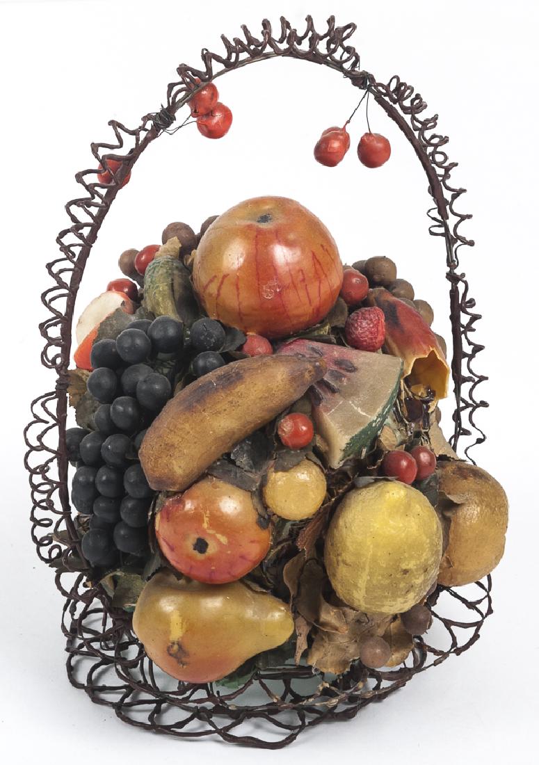 Wire basket fitted with an assortment of wax frui (1 of 2)