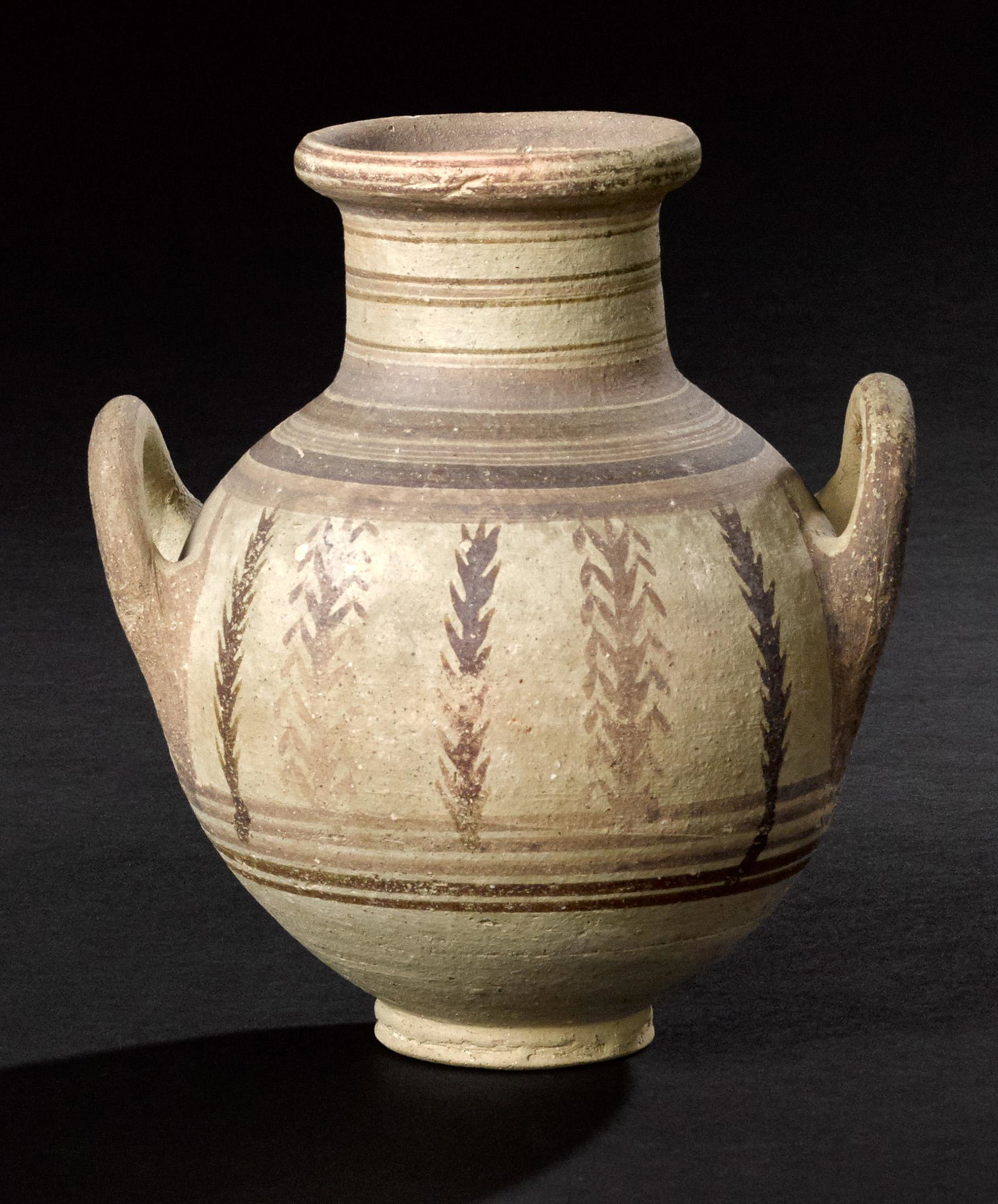 Cypriot bichrome ware amphora: Cypriot bichrome ware amphora, 750-600 B.C., with vegetal motifs and concentric rings around the body, 8 1/2'' h. Provenance: A private English collection, acquired in 1950-1975, and later purchased i