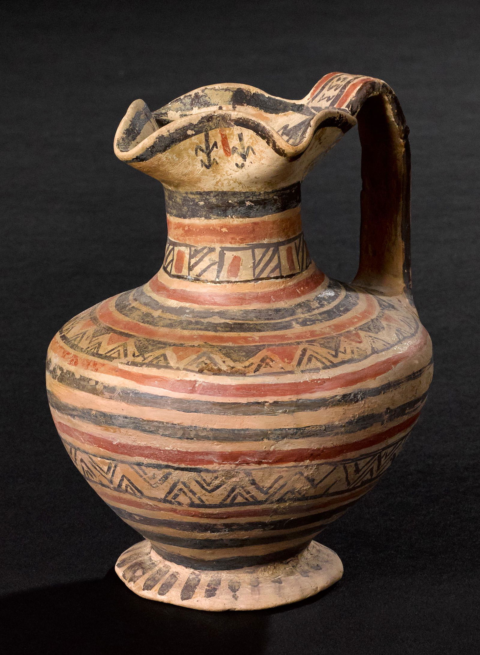 Messapian trefoil oinochoe: Messapian trefoil oinochoe, 5th-4th c. B.C., 6 1/4'' h. Provenance: The Collection of Aldo Branco, Switzerland, acquired between 1960 and 1980, Bonham's London, May 2012, sale 20164, lot 170 and later