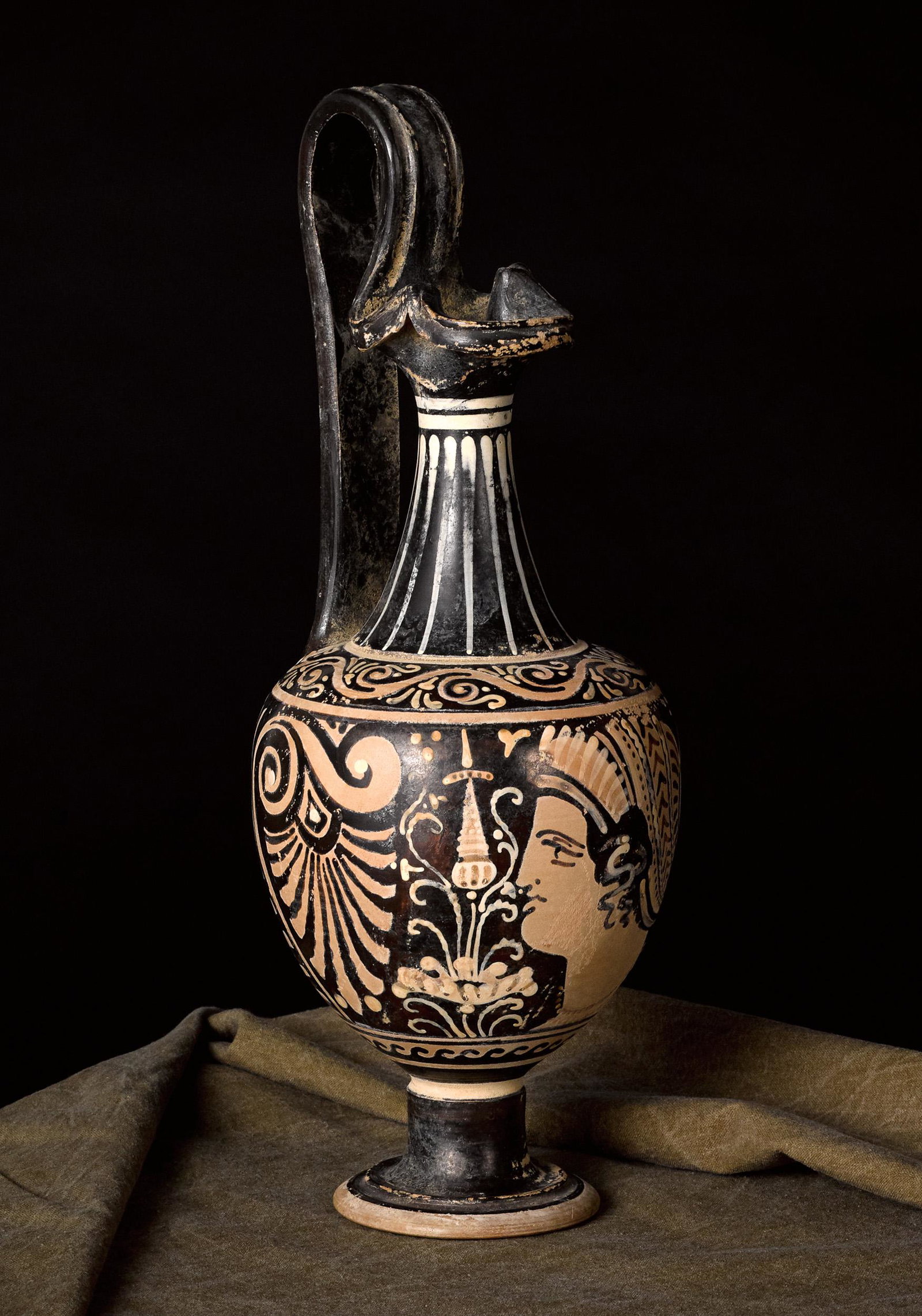 Paestan red figure oinochoe: Paestan red figure oinochoe, 4th c. B.C., with a lady of fashion, 11 5/8'' h.