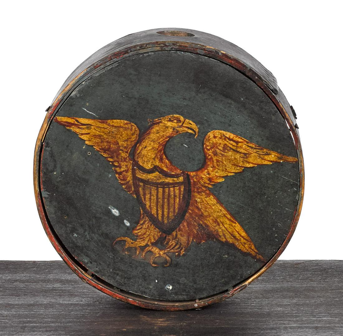 Painted American militia bentwood canteen: Painted American militia bentwood canteen, ca. 1800, having a gilt spread wing eagle with shield chest and red highlights, all on a blue ground, 2'' h., 5 3/4'' dia. Provenance: A Maryland collection.