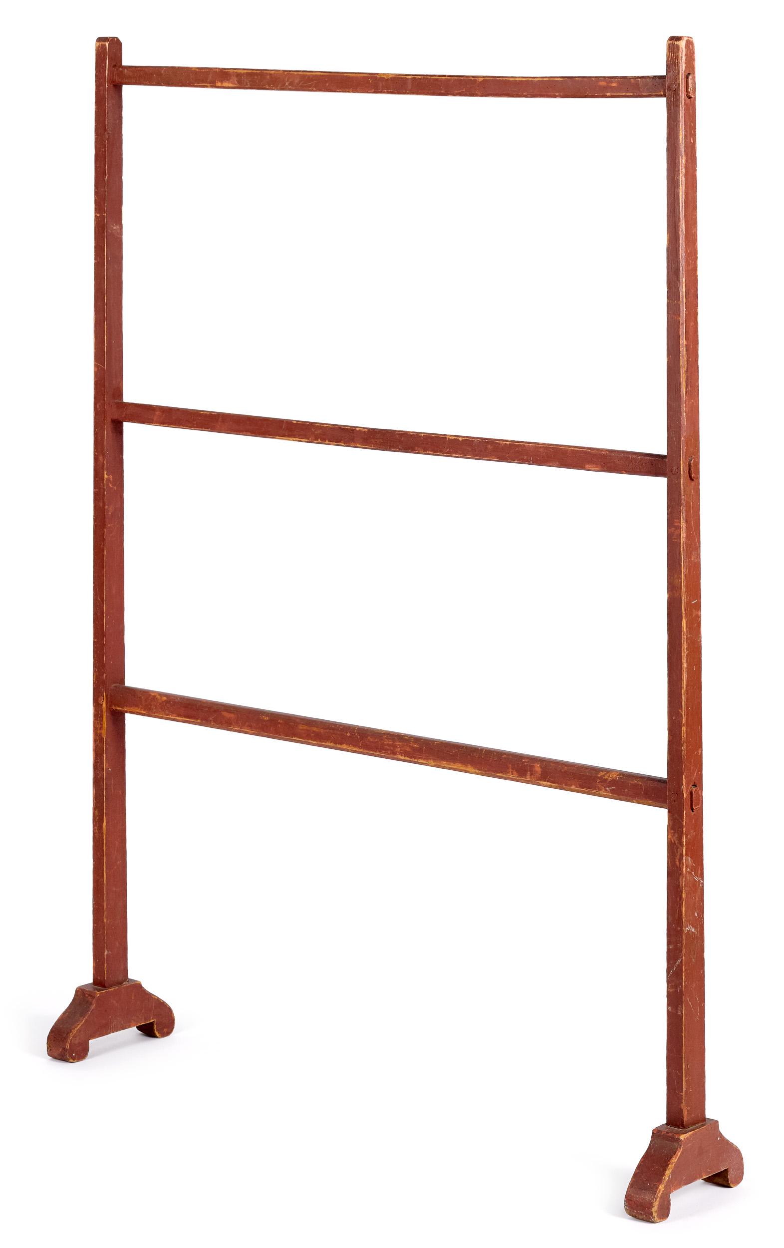 Shaker painted pine quilt or herb drying rack: Shaker painted pine quilt or herb drying rack, 19th c., retaining an old red surface, 55'' h., 39'' w. Provenance: A Maryland collection.