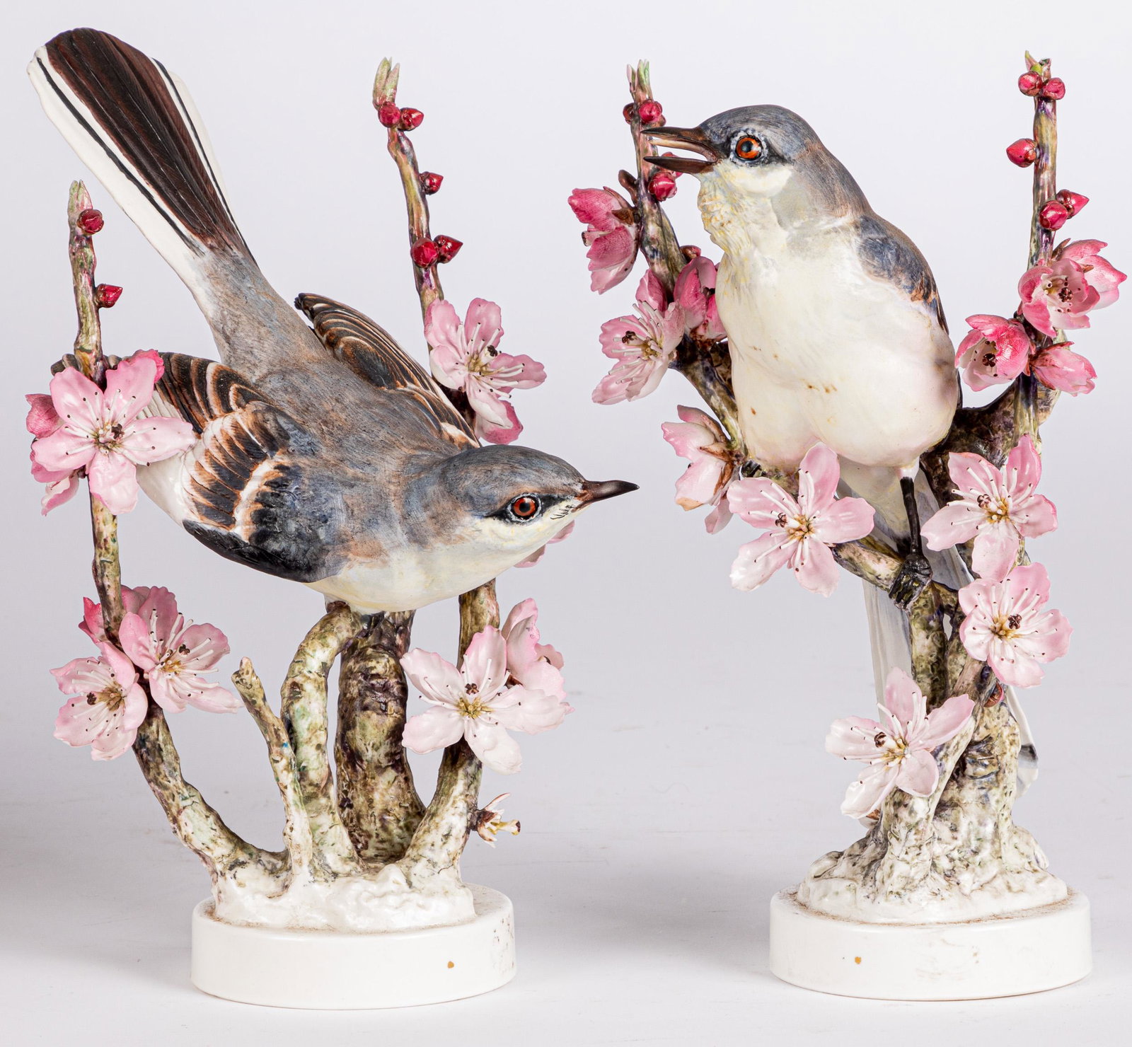 Pair of Royal Worcester Mockingbirds: Pair of Royal Worcester Mockingbirds, 10 3/4'' h.