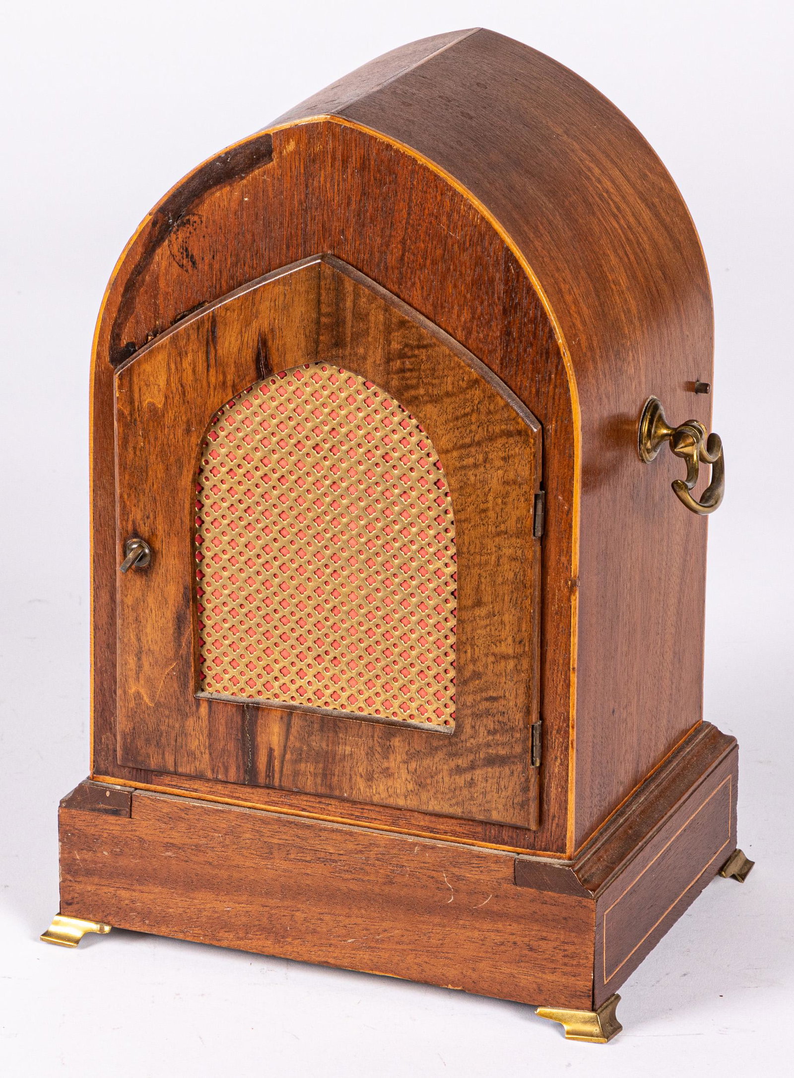 German mahogany mantle clock: German mahogany mantle clock retailed by J. E. Caldwell, 13'' h.