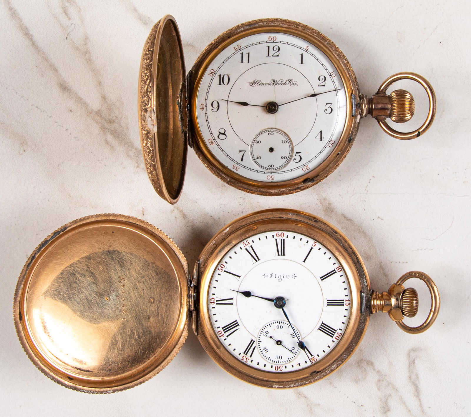 Two gold filled hunter case pocket watches: Two gold filled hunter case pocket watches, to include an Illinois, serial # 311609 and an Elgin, serial # 8935942.