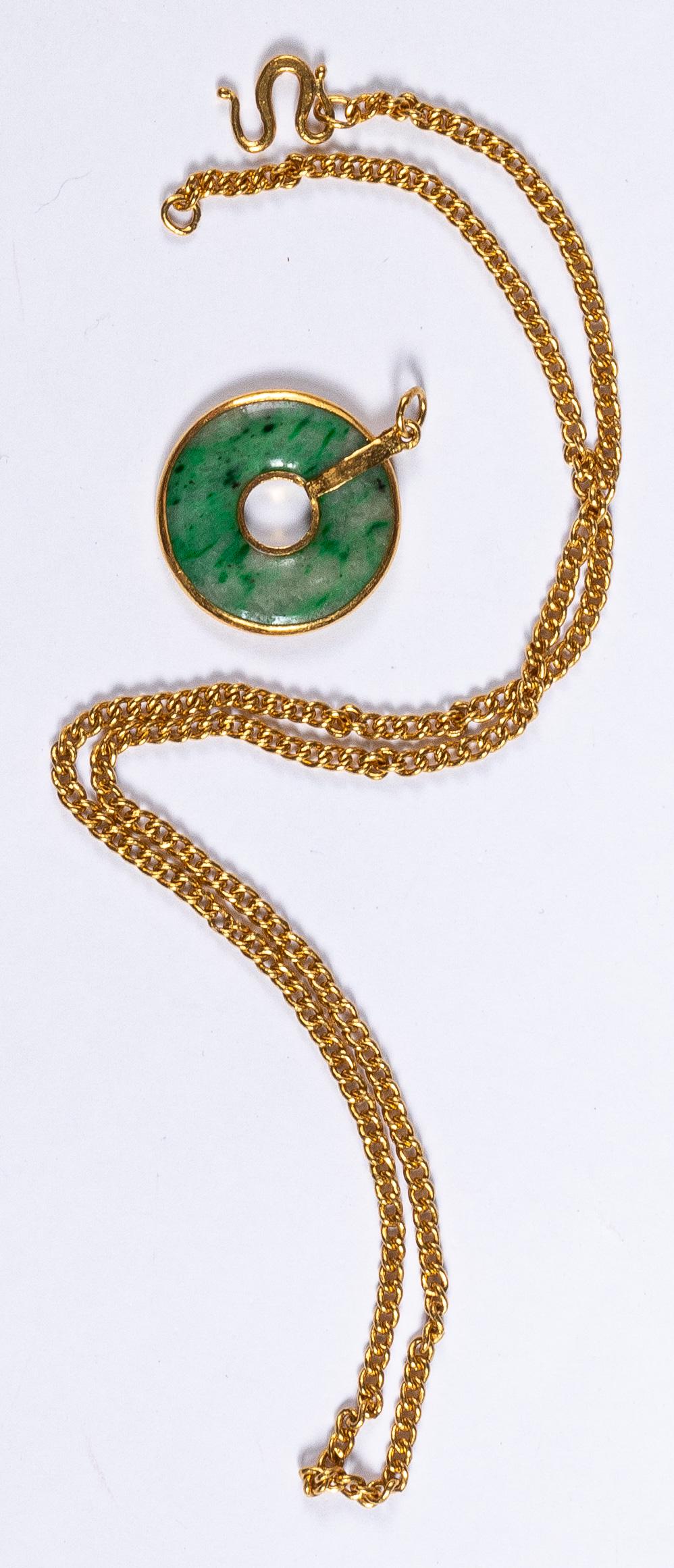 22K gold necklace, etc.: 22K gold necklace, 15.3 dwt., together with a jade pendant.