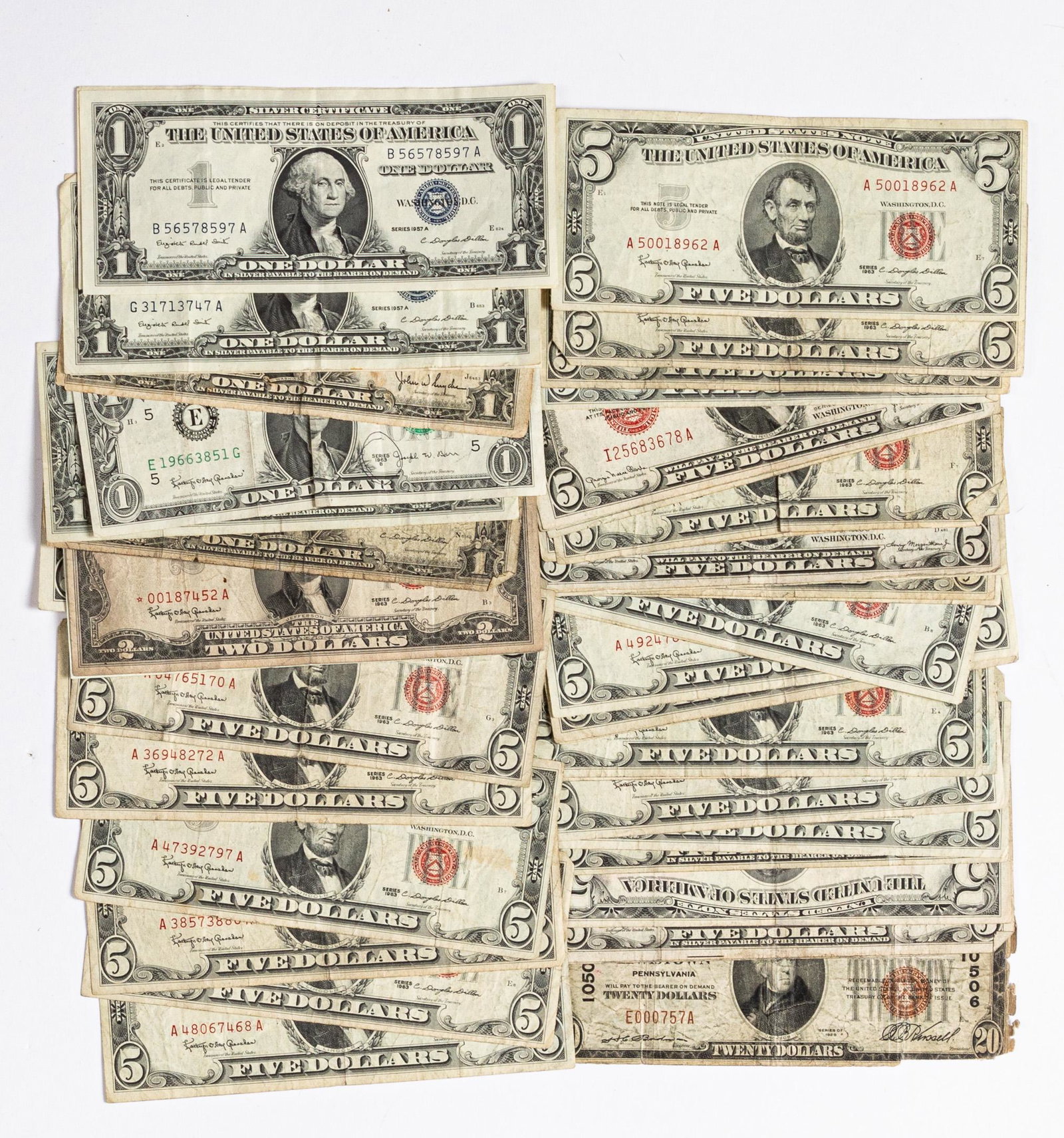 US paper currency, mostly red and blue seal notes: US paper currency, mostly red and blue seal notes, approximately $192 face value.
