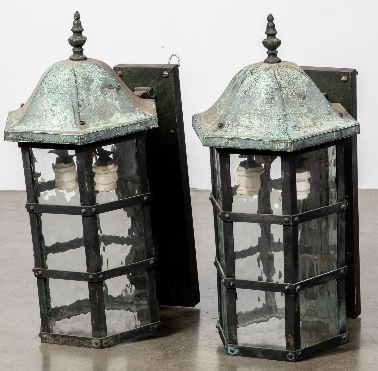 Pair of bronze architectural wall sconce lights: Pair of bronze architectural wall sconce lights, ca. 1900, 24'' h.