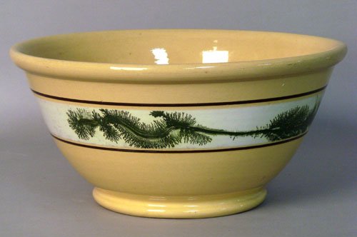 Large yelloware mixing bowl with seaweed decorati: Large yelloware mixing bowl with seaweed decoration, 7'' h., 14 1/4'' dia.