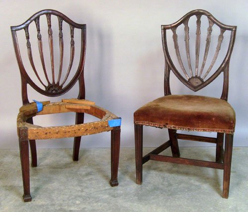 Two Hepplewhite mahogany shieldback dining chairs: Two Hepplewhite mahogany shieldback dining chairs.