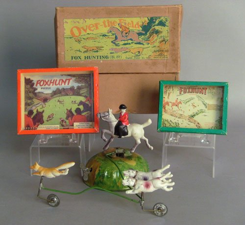 Tin Over-the-Field fox hunting game, together w: Tin Over-the-Field fox hunting game, together with two fox hunt puzzles.
