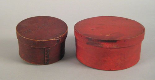 Two red painted bentwood boxes, 19th c., the sm: Two red painted bentwood boxes, 19th c., the smaller one inscribed Beulah, 3 1/2'' h., 7 3/4'' w. and 3 1/4'' h., 5 3/4'' w.