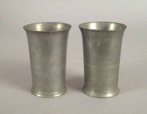 New York pewter beaker, ca. 1835, bearing the t: New York pewter beaker, ca. 1835, bearing the touch of Boardman & Hart, 5 1/8'' h., together with a similar beaker.