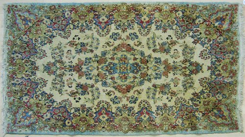Kirman throw rug, 7' x 4'.