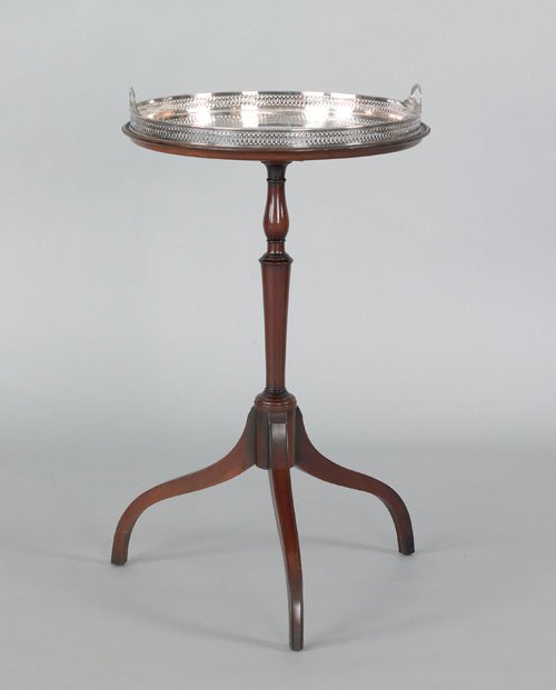 Regency style mahogany end table, with a Sheffi: Regency style mahogany end table, with a Sheffield tray top, 27'' h., 16'' dia. together with another stand, 24'' h., 12 1/2'' dia.