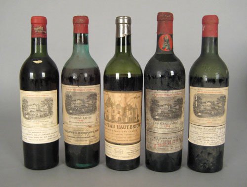 Five 750ML bottles, comprising 1934 Lafite Roth: Five 750ML bottles, comprising 1934 Lafite Rothschild, 1943 Lafite Rothschild, 1945 Lafite Rothschild, 1952 Lafite Rothschild and 1952 Haut Brion. LOT CANNOT BE SHIPPED.