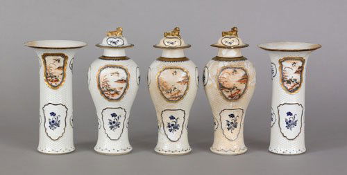 Chinese export porcelain five piece garniture se: Chinese export porcelain five piece garniture set, ca. 1790, each with Chinese landscapes and floral panels on a basketweave reserve, 10'' h., 11 1/2'' h.