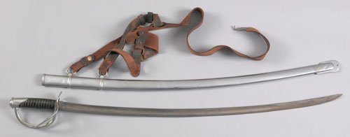 Mansfield & Lamb model 1840 cavalry saber with: Mansfield & Lamb model 1840 cavalry saber with scabbard, marked on the reverse U.S. CEW 1865, the original leather hanger inscribed Geo. Clark 11355, blade - 35'' l.