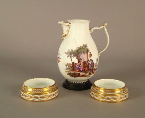 Rare pair of Meissen porcelain wine coasters, 19: Rare pair of Meissen porcelain wine coasters, 19th c., with gilt decoration, 1 1/2'' h., 4 1/4'' dia., together with a Meissen pot decorated with figures in a landscape, 8 1/2'' h.