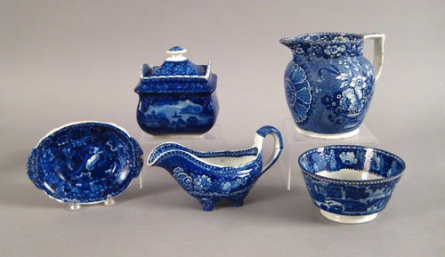 Five blue Staffordshire tablewares, 19th c., to: Five blue Staffordshire tablewares, 19th c., to include a pitcher, 5 3/4'' h., covered sugar, waste bowl, gravy boat, and soap dish.