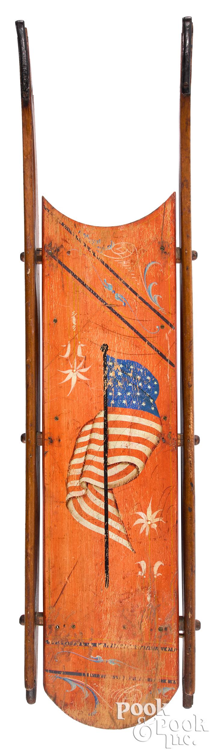 Painted sled, decorated with the American flag (1 of 2)