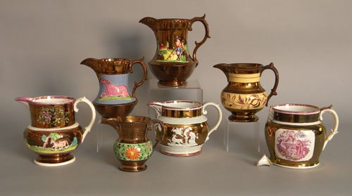 Seven copper luster pitchers, 19th c., 7 1/2'' h. : Seven copper luster pitchers, 19th c., 7 1/2'' h. (tallest).