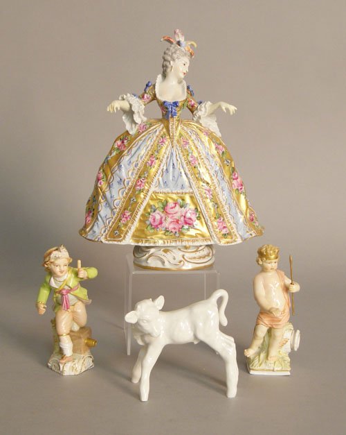 Three KPM porcelain figures, together with a Meis: Three KPM porcelain figures, together with a Meissen figure of a cow, tallest - 8 1/4''.