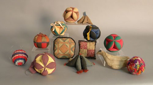 Thirteen Pennsylvania sewing balls and pin cushio: Thirteen Pennsylvania sewing balls and pin cushions, 19th c./early 20th c.
