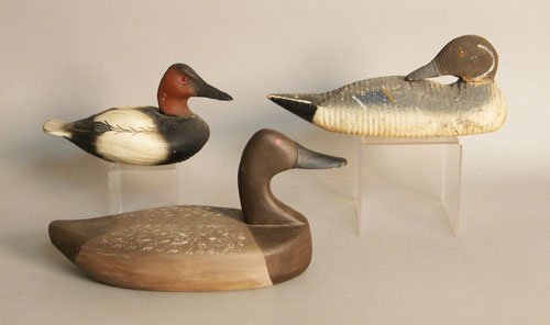 Three duck decoys to include one stamped Victor: Three duck decoys to include one stamped Victor, one Ray Willis, and on Veasy.