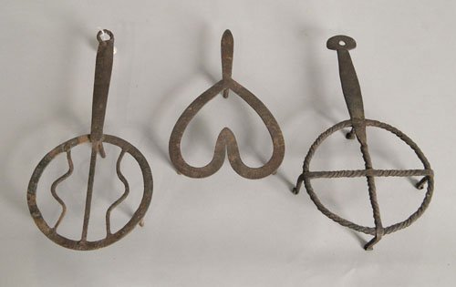 Three wrought iron trivets, 19th c., largest - 6': Three wrought iron trivets, 19th c., largest - 6'' dia.