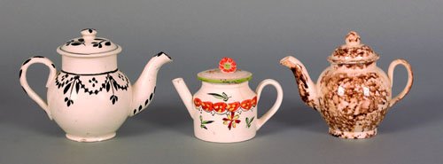 Three miniature creamware teapots, 19th c., 3 3: Three miniature creamware teapots, 19th c., 3 3/4'' h., 4'' h., 3'' h.